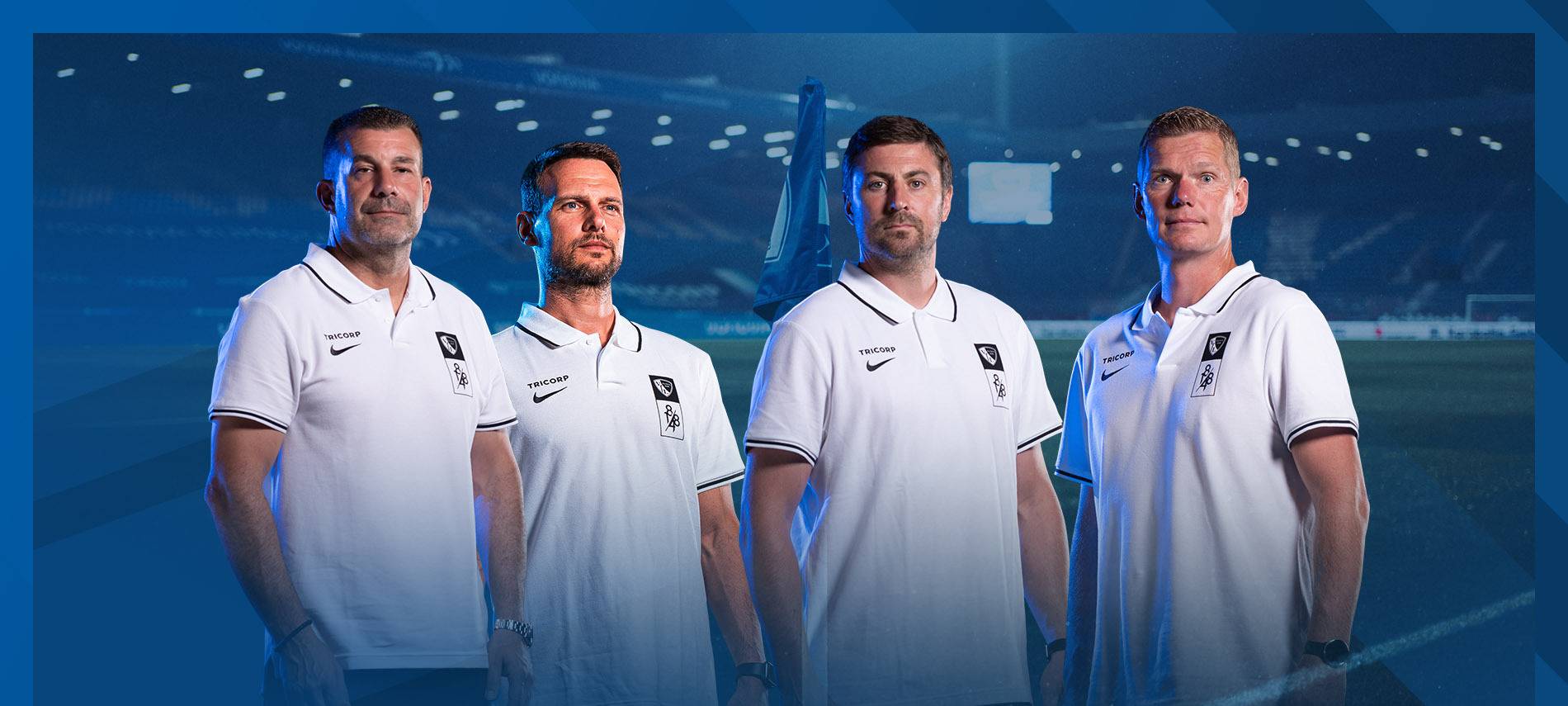 Die vier Trainer stehen nebeneinander